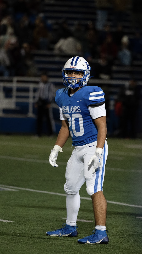 Gabe Williams (10), running back, looks off field before the start of the play. He looks off the field to his coaches for instructions on the next play.